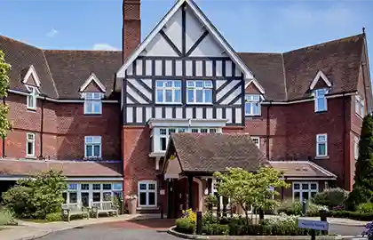 Exterior image of Bagshot Gardens care home in Bagshot