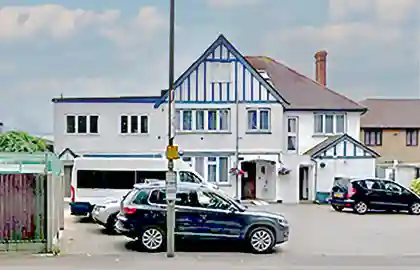 Exterior view of Firtree House care home in Banstead
