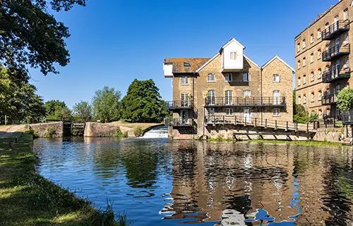 Coxes Lock and flour mill on the River Wey in Addlestone, Surrey