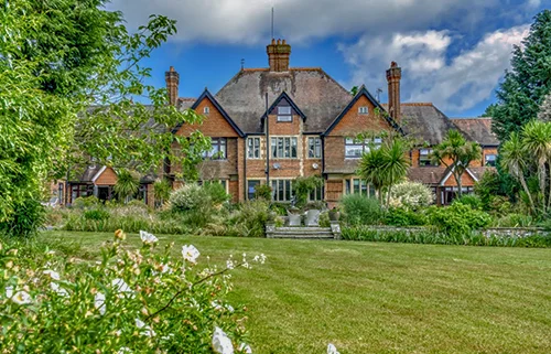 Exterior view of Pendean House care home in West Lavington, Midhurst