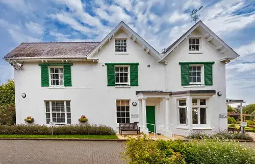 Exterior view of Red Oaks care home in Henfield